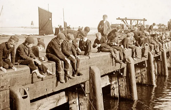 Framed Print : Boys fishing on a pier early 1900s Framed Print : Boys fishing on a pier early 1900s
