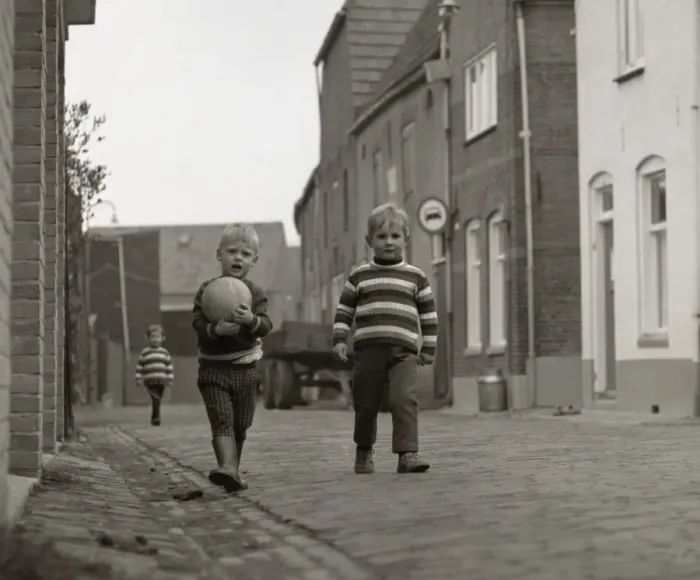 Framed Print : Two boys with a football in the street Framed Print : Two boys with a football in the street
