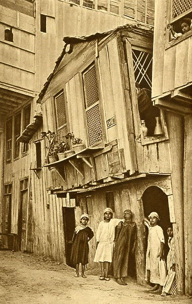 Boys and girls outside their homes, Port Said, Egypt