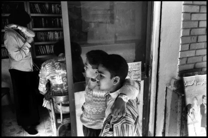 Framed Print : Two boys outside Egyptian bookshop, Egypt Framed Print : Two boys outside Egyptian bookshop, Egypt