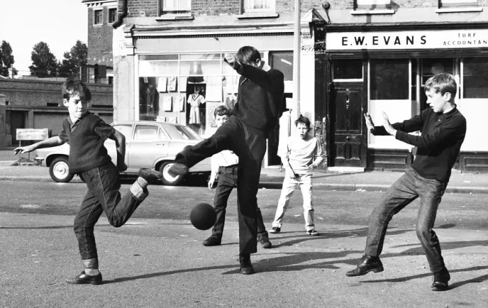 Framed Print : Boys playing football in a street, Balham, SW London Framed Print : Boys playing football in a street, Balham, SW London