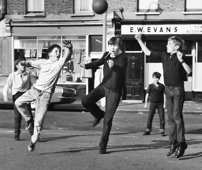Framed Print : Boys playing football in a street, Balham, SW London Framed Print : Boys playing football in a street, Balham, SW London