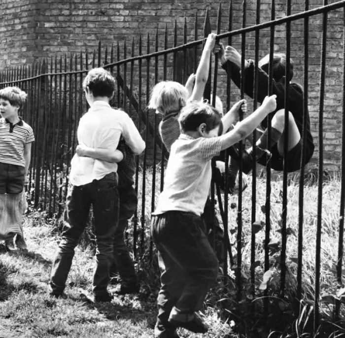 Framed Print : Boys playing on railings, Balham, SW London Framed Print : Boys playing on railings, Balham, SW London