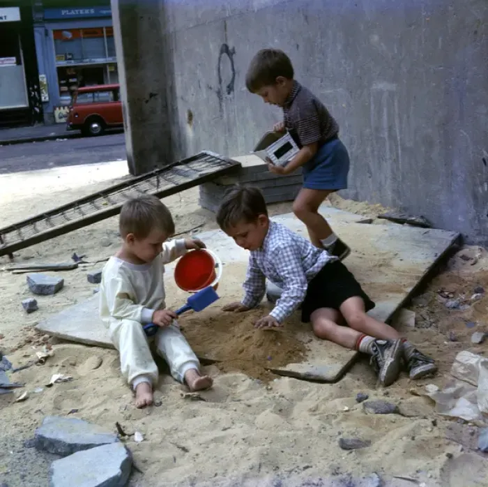 Framed Print : Three boys playing with sand in a Balham street, SW London Framed Print : Three boys playing with sand in a Balham street, SW London