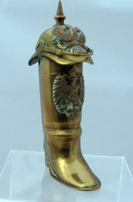 Framed Print : Brass lighter in the form of a jackboot, WW1 Framed Print : Brass lighter in the form of a jackboot, WW1