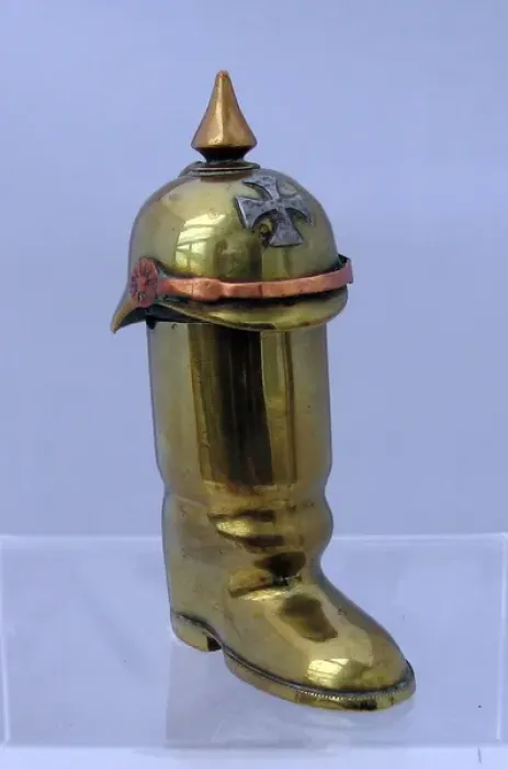 Framed Print : Brass lighter in the form of a jackboot, WW1 Framed Print : Brass lighter in the form of a jackboot, WW1
