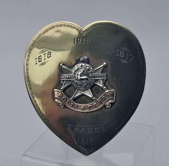 Framed Print : Brass souvenir in the form of a heart, WW1 Framed Print : Brass souvenir in the form of a heart, WW1