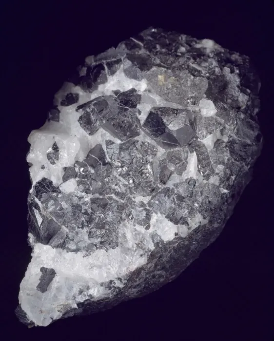 Framed Print : Braunite is a native oxide of manganese. Its crystals are dark brownish black in colour Framed Print : Braunite is a native oxide of manganese. Its crystals are dark brownish black in colour