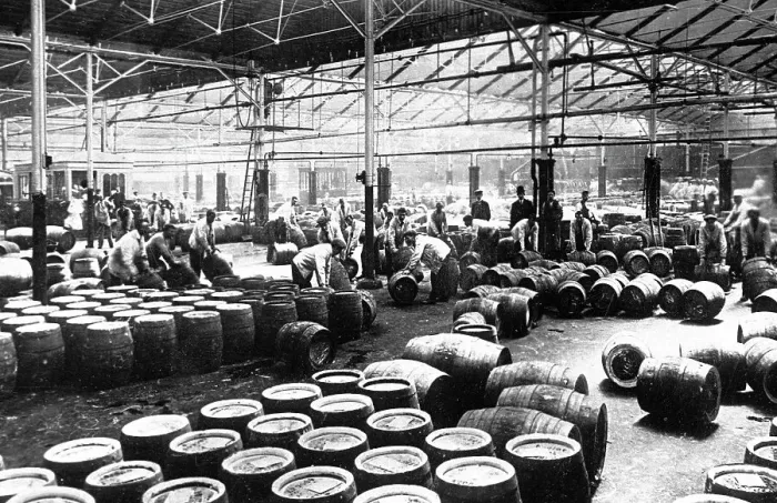 Framed Print : Brewing Industry cask filling early 1900s Framed Print : Brewing Industry cask filling early 1900s