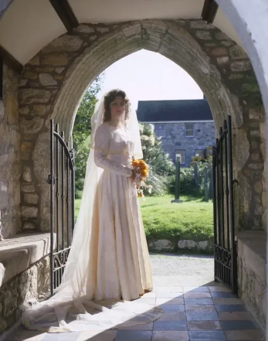 Framed Print : Bride in church porch, Marazion, Cornwall Framed Print : Bride in church porch, Marazion, Cornwall