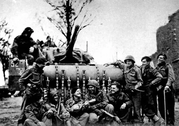 Framed Print : British and American troops singing beside a Sherman Flail T