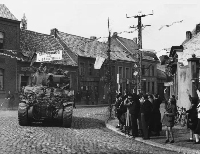 Framed Print : British armour enter Belgium, one of the first tanks passing through the village of Framed Print : British armour enter Belgium, one of the first tanks passing through the village of
