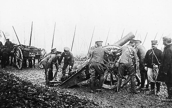 British Gunners placing a line of artillery guns during WW1