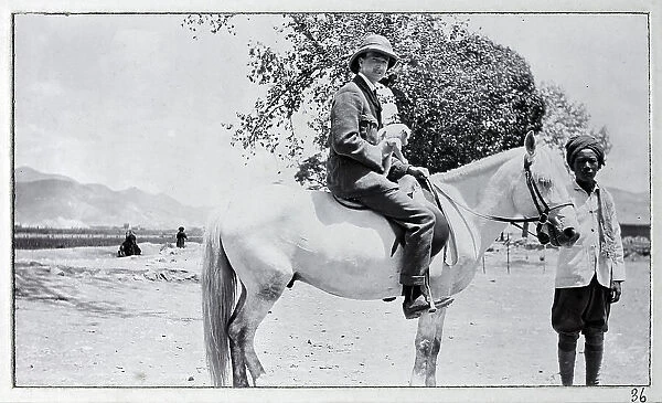 British man on a white horse (Sunstar) with Tibetan (Tsewangdi, nicknamed Bill Sykes) on right, from a fascinating album which reveals new details on a little-known campaign in which a British military force brushed aside Tibetan defences to capture