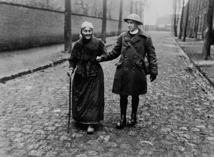 Framed Print : British padre with elderly woman, Western Front, WW1 Framed Print : British padre with elderly woman, Western Front, WW1