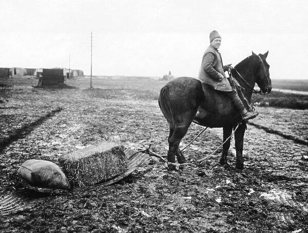 British soldier with corrugated iron for transport, WW1