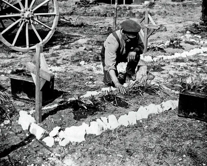 Framed Print : British soldier tending grave of fallen colleague, WW1 Framed Print : British soldier tending grave of fallen colleague, WW1