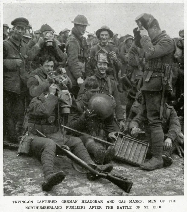 Framed Print : British soldiers trying on captured German headgear 1916 Framed Print : British soldiers trying on captured German headgear 1916