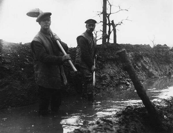 Two British soldiers working in a ditch, WW1