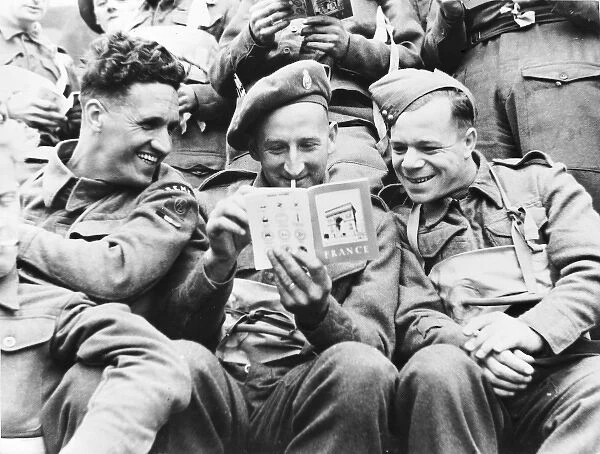 British troops reading French guide