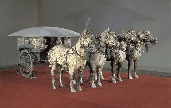 Bronze chariot drawn by four horses. 3rd BC