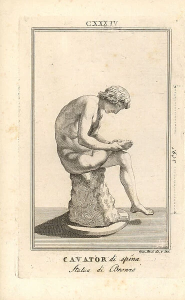 Bronze statue of a young man removing a thorn from his foot