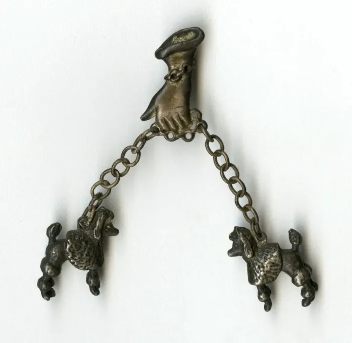 Framed Print : Brooch -- hand taking two poodles for a walk Framed Print : Brooch -- hand taking two poodles for a walk