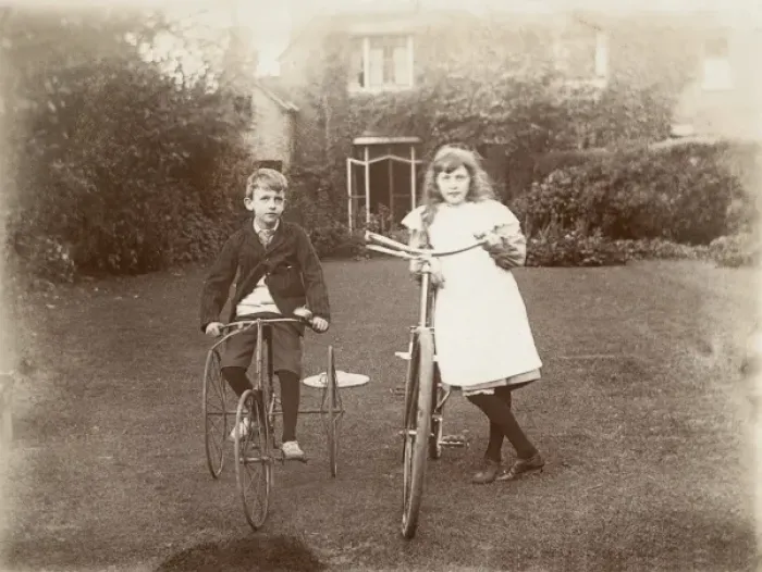 Framed Print : Brother and Sister with their cycles Framed Print : Brother and Sister with their cycles