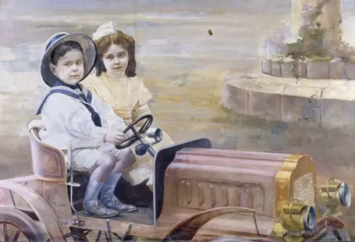 Framed Print : Brother and sister in a toy vintage car Framed Print : Brother and sister in a toy vintage car