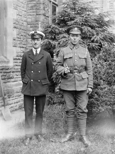 Two brothers in uniform, prepared for war