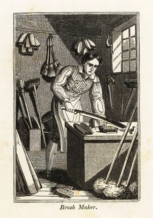 Framed Print : Brushmaker trimming a broomhead in a workshop Framed Print : Brushmaker trimming a broomhead in a workshop