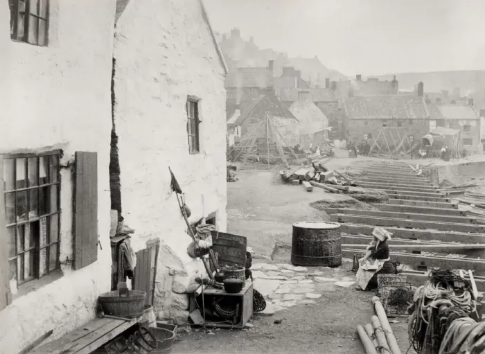 Framed Print : Buidling work along the seafront in Staithes, Yorkshire Framed Print : Buidling work along the seafront in Staithes, Yorkshire