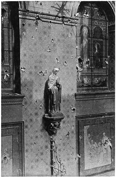 Bullet-holes in the walls and windows of an Ypres convent