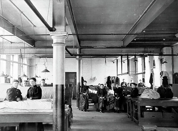 Burling and mending pieces in a woollen mill in Bradford
