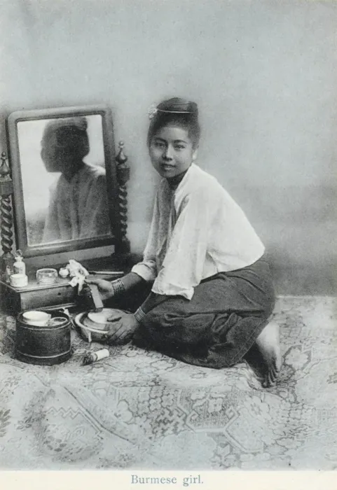 Framed Print : A Burmese girl preparing her make-up Framed Print : A Burmese girl preparing her make-up