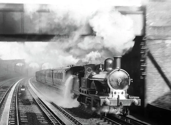 Framed Print : Bushey Steam Train picking up water early 1900s Framed Print : Bushey Steam Train picking up water early 1900s