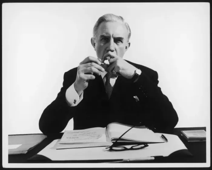 Framed Print : Businessman Lights Cigar Framed Print : Businessman Lights Cigar