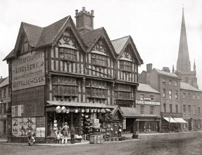 Framed Print : Busy shopfront, English town, c. 1880 s Framed Print : Busy shopfront, English town, c. 1880 s