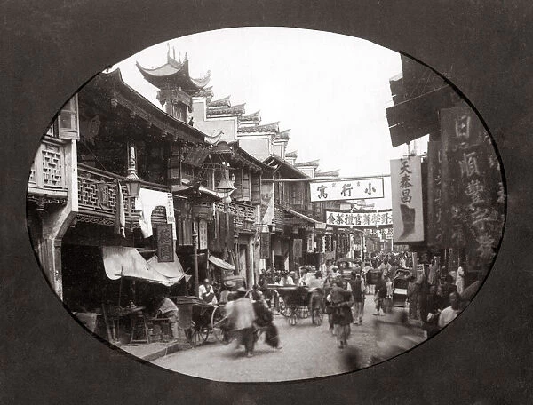Busy street scene in Shanghai, China, c. 1880 s
