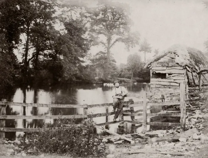 Framed Print : c. 1860s - English rural scene - farmer on gate by river Framed Print : c. 1860s - English rural scene - farmer on gate by river