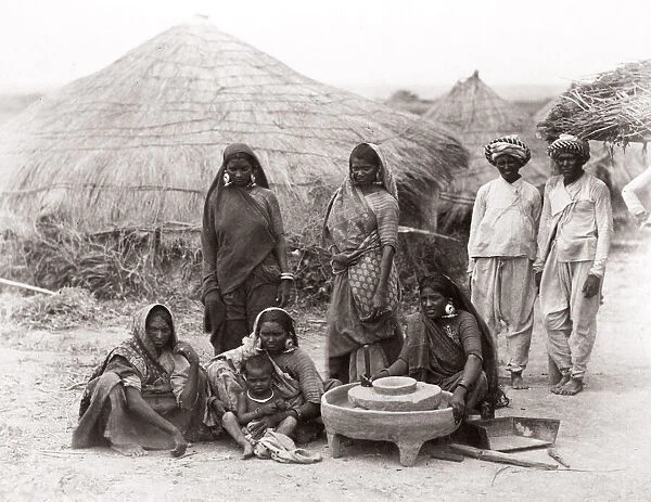 c. 1880 India - India village group milling grain