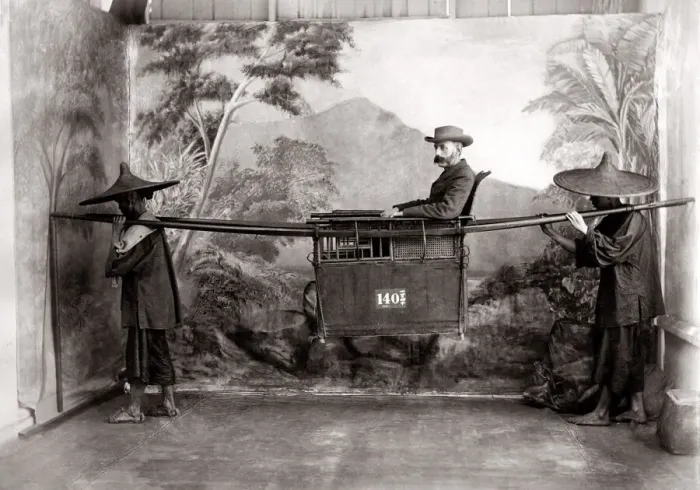 Framed Print : c. 1880s China - man in a sedan chair with bearers Framed Print : c. 1880s China - man in a sedan chair with bearers