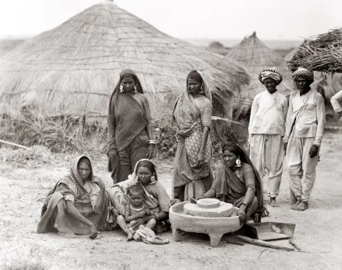 Framed Print : c. 1880s India - group of hill people, women grinding grain Framed Print : c. 1880s India - group of hill people, women grinding grain