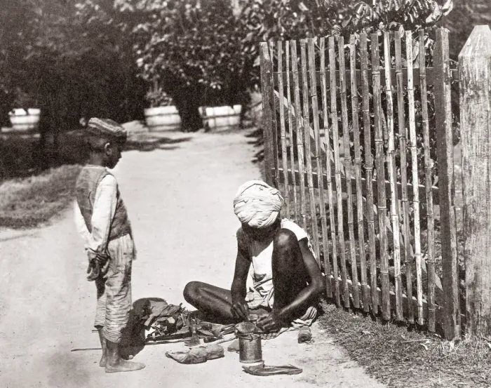 Framed Print : c. 1880s India - street worker - cobbler? Framed Print : c. 1880s India - street worker - cobbler?