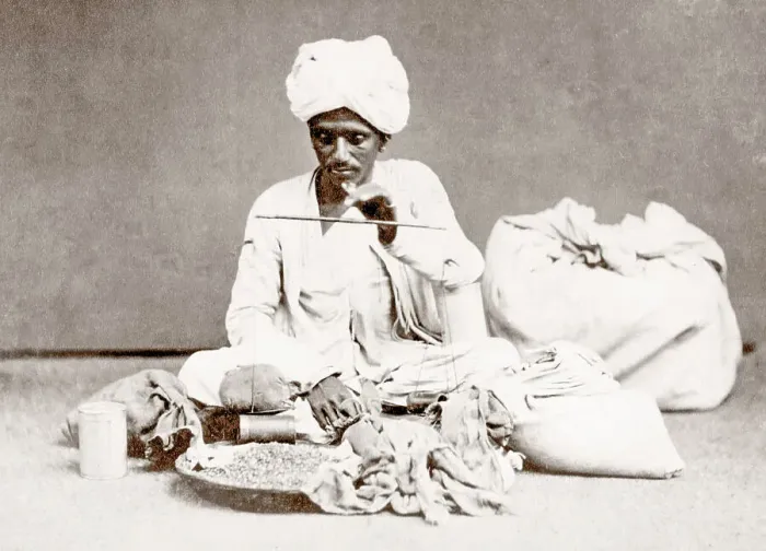 Framed Print : c. 1880s India - weighing spices or other dry goods Framed Print : c. 1880s India - weighing spices or other dry goods