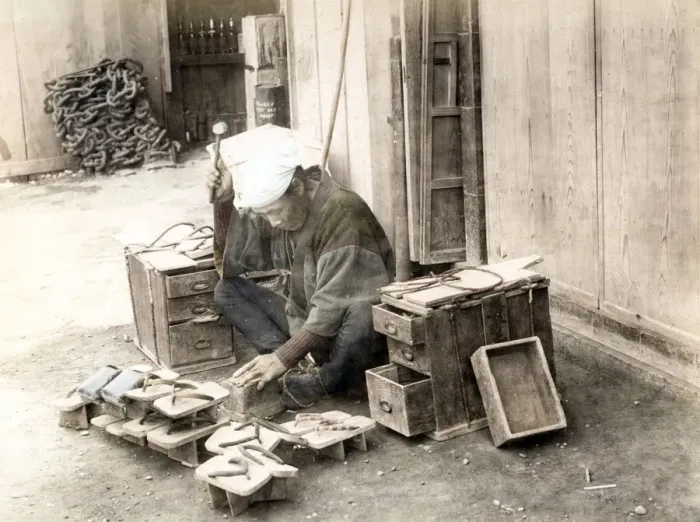 Framed Print : c. 1880s Japan - cobbler / shoe maker at work Framed Print : c. 1880s Japan - cobbler / shoe maker at work