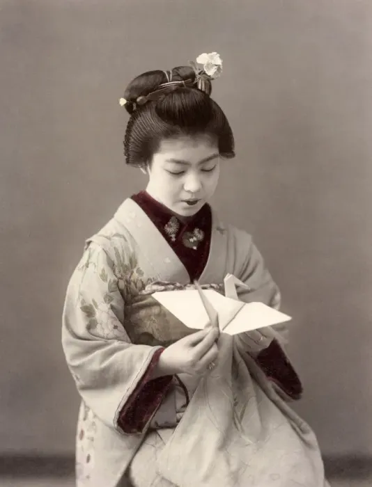 Framed Print : c. 1880s Japan - geisha with a paper bird Framed Print : c. 1880s Japan - geisha with a paper bird