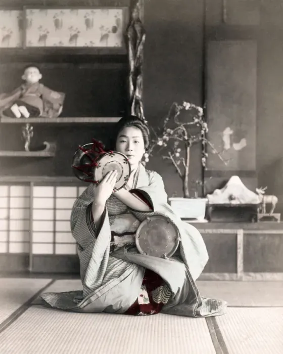 Framed Print : c. 1880s Japan - geisha playing a drum Framed Print : c. 1880s Japan - geisha playing a drum