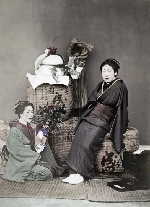Framed Print : c. 1880s Japan - two geishas with baskets and flowers Framed Print : c. 1880s Japan - two geishas with baskets and flowers