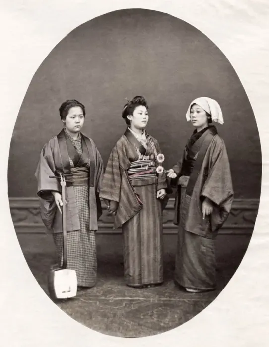 Framed Print : c. 1880s Japan - geishas, flowers and a shamisen Framed Print : c. 1880s Japan - geishas, flowers and a shamisen
